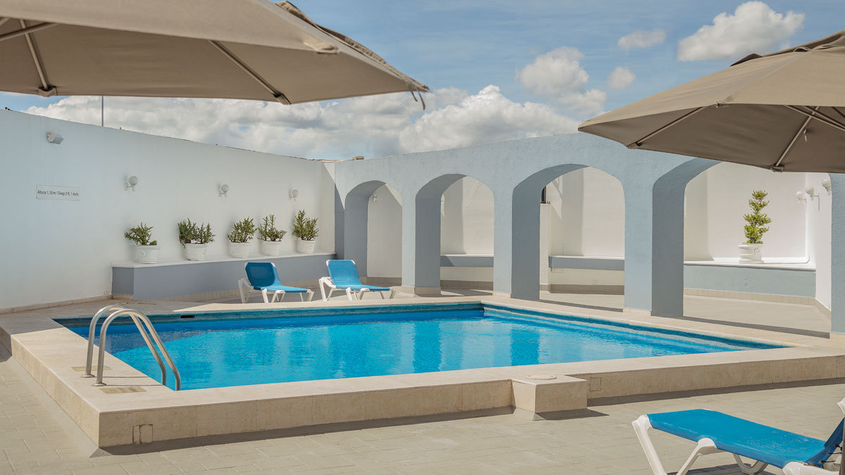 Hospédate en nuestro hotel con alberca en Puebla