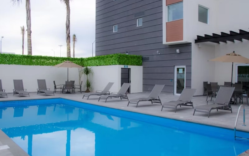 Habitaciones en Celaya y suites en hotel con alberca para posadas corporativas